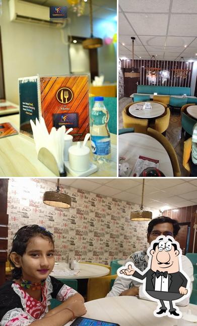 Take a look at the image showing interior and beverage at Dabbawala
