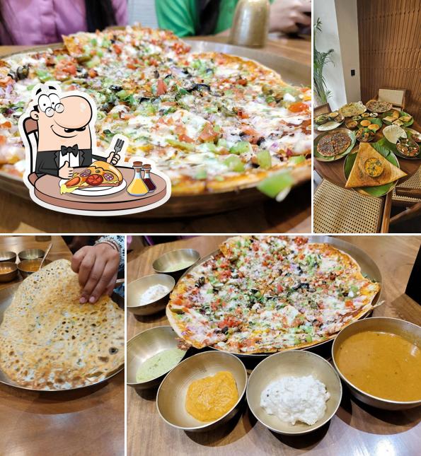 Get pizza at Banana Patra