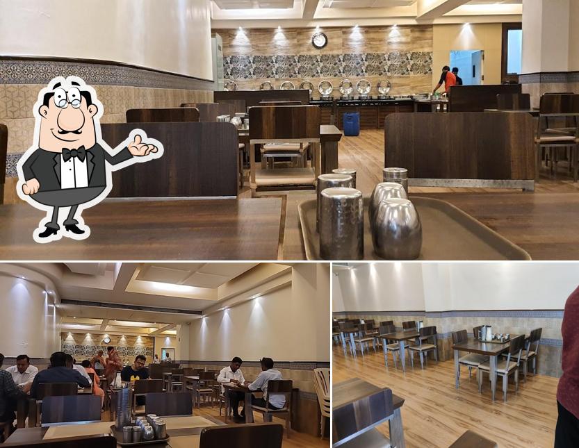 Take a seat at one of the tables at Samrasi Premium Gujarati dinning