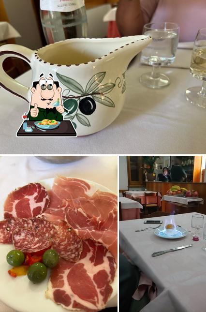 La foto di cibo e tavolo da pranzo da Ristorante Da Guerriero
