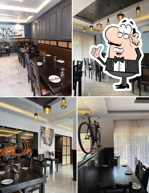 Take a seat at one of the tables at Vintage Restaurant (Pernem)