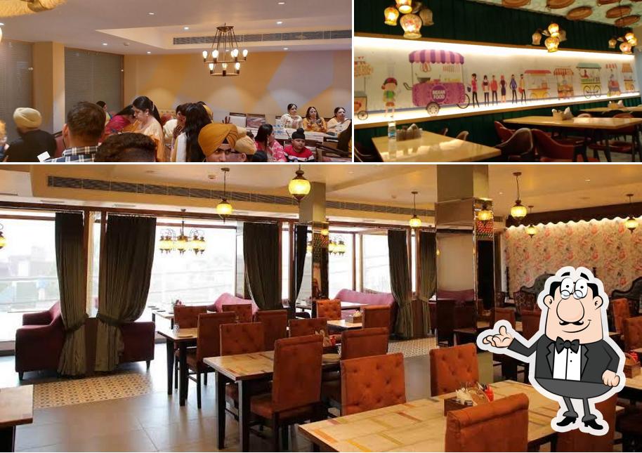 Take a seat at one of the tables at HICHKI RESTAURANT