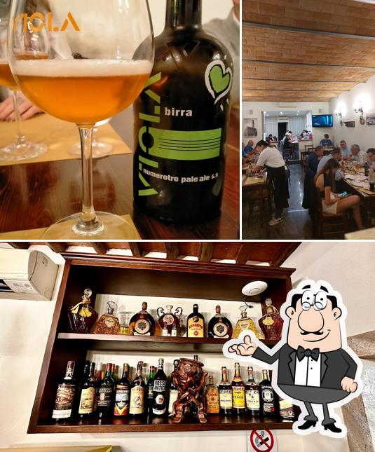 Dai un’occhiata alla foto che presenta la interni e bevanda di Da Bertone Pizzeria Ristorante