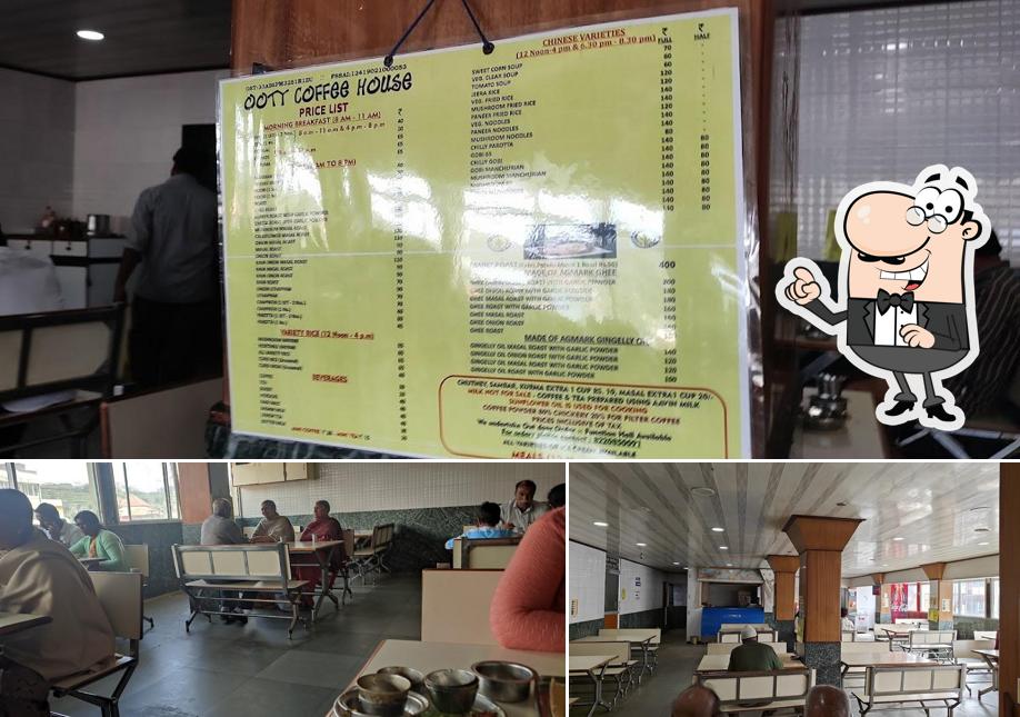 Take a seat at one of the tables at Ooty Coffee House