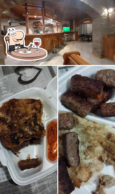 Tra le diverse cose da Pizzeria Oliva si possono trovare la cibo e interni