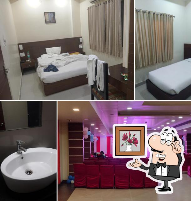 Take a seat at one of the tables at Hotel The Emerald