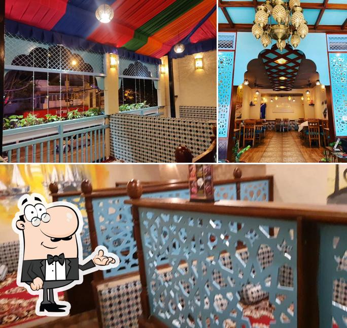 Take a seat at one of the tables at Raidan Restaurant