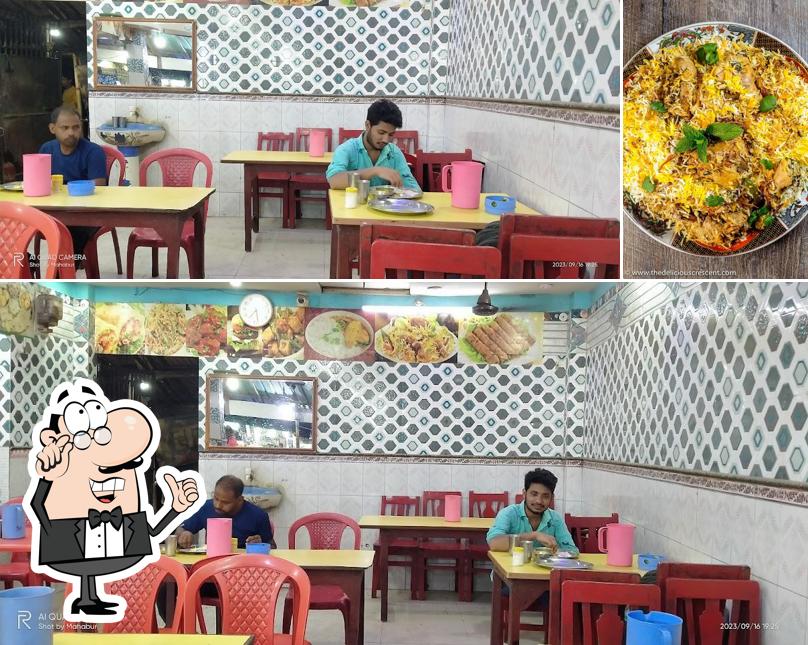 The photo of interior and food at Kathi Junction