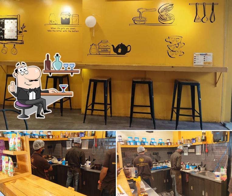 Take a seat at one of the tables at The Belgian Waffle Co