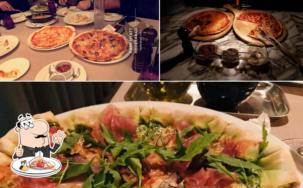 Try out pizza at Tre-Forni Bar & Restaurant