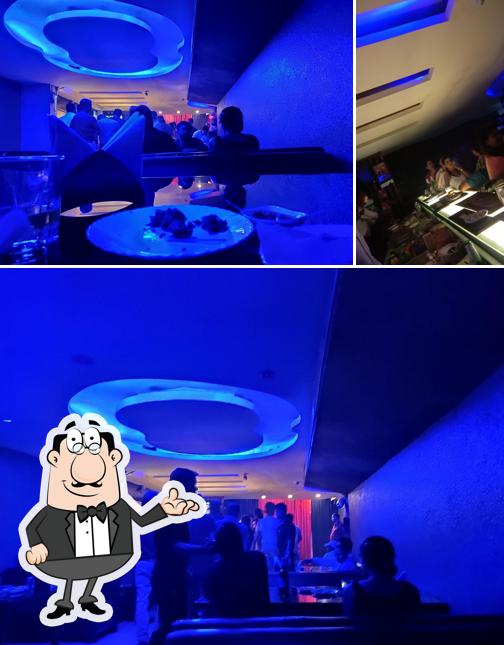 This is the image depicting interior and beverage at ILLUSION