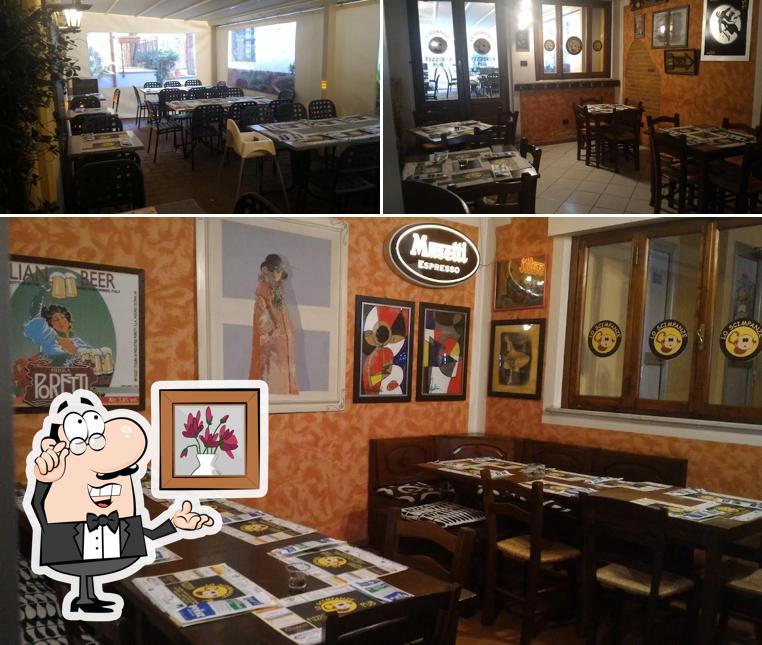 Siediti a un tavolo di Pizzeria Lo Scimpanze'