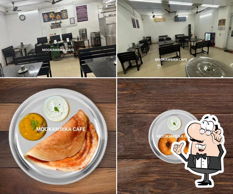 The image of Mookambika Cafe - South Indian Vegetarian Restaurant’s interior and food