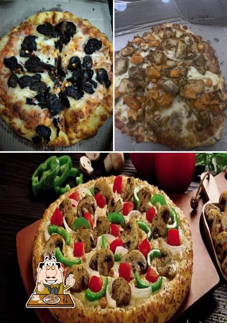 Try out pizza at Domino's Pizza RS Plaza, Siliguri