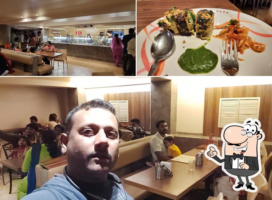 This is the picture showing interior and food at Sai Sagar Food Court