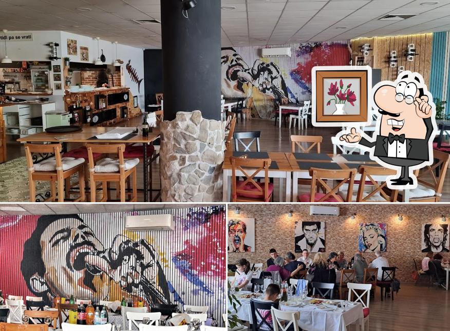 Siediti a un tavolo di Restaurant Pizzeria Dir