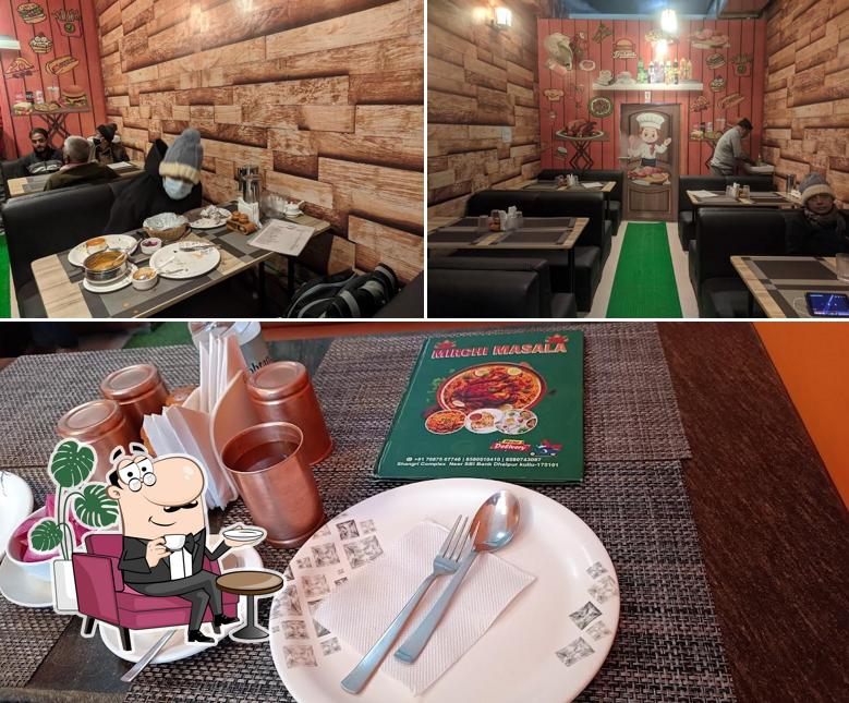 The photo of interior and food at Mirchi Masala90Kullu