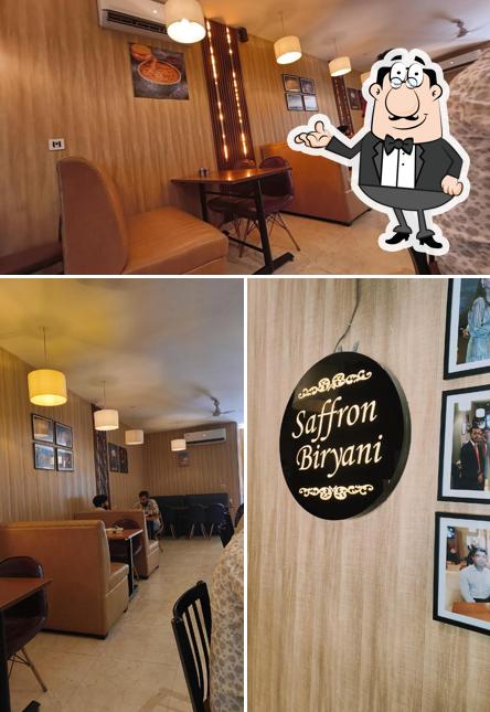 Take a seat at one of the tables at Saffron Biryani