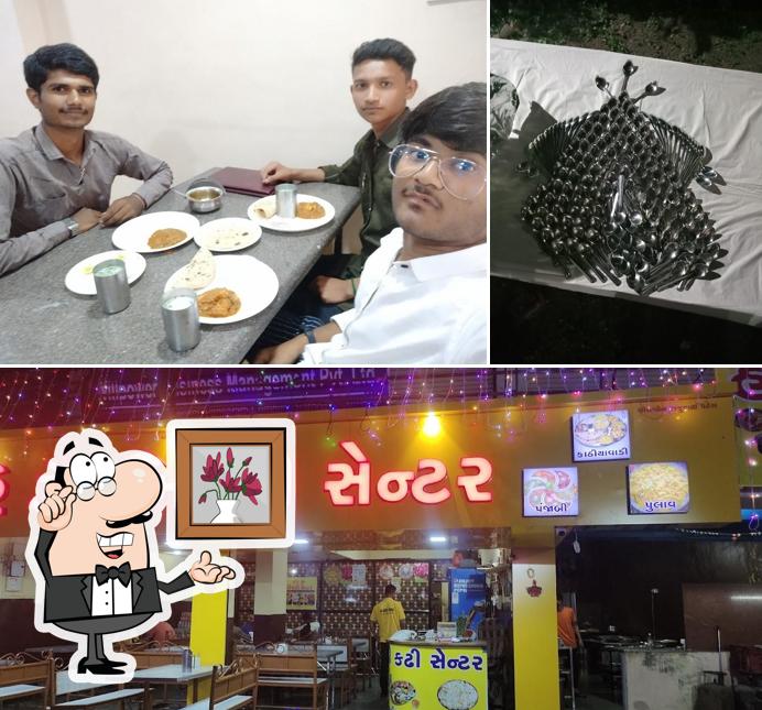 Take a seat at one of the tables at Hari Om Khichadi Center