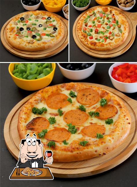 Pick pizza at Pizza inn manjeri