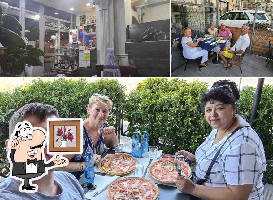 Dai un'occhiata agli interni di Trattoria Pizzeria SAN MICHELE
