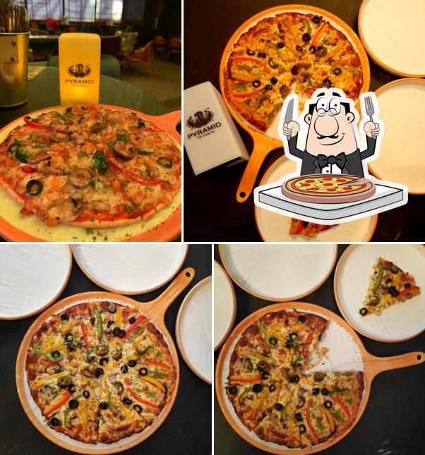 Get pizza at Egyptian Brewery Best bar & Pub In Ranjit avenue Amritsar- Restro Bar in amritsar- best Night Club in Amritsar