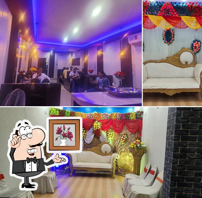 Take a seat at one of the tables at Savera restaurant
