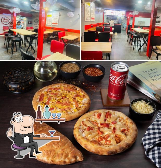 The picture of interior and food at Pizza Galleria Baghpat