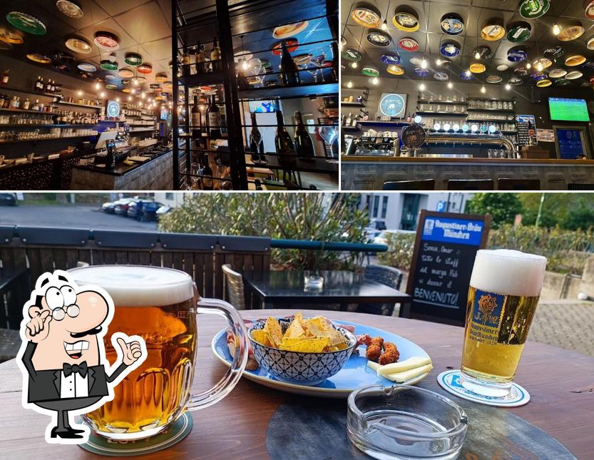 Questa è la foto che presenta la interni e cibo di Marga Pub