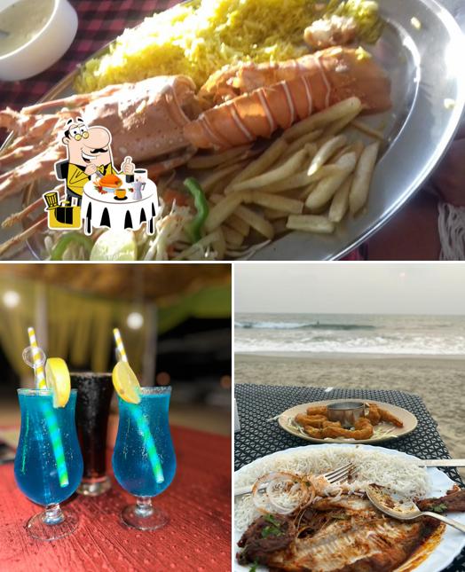 The photo of food and drink at Jammy's beach shack