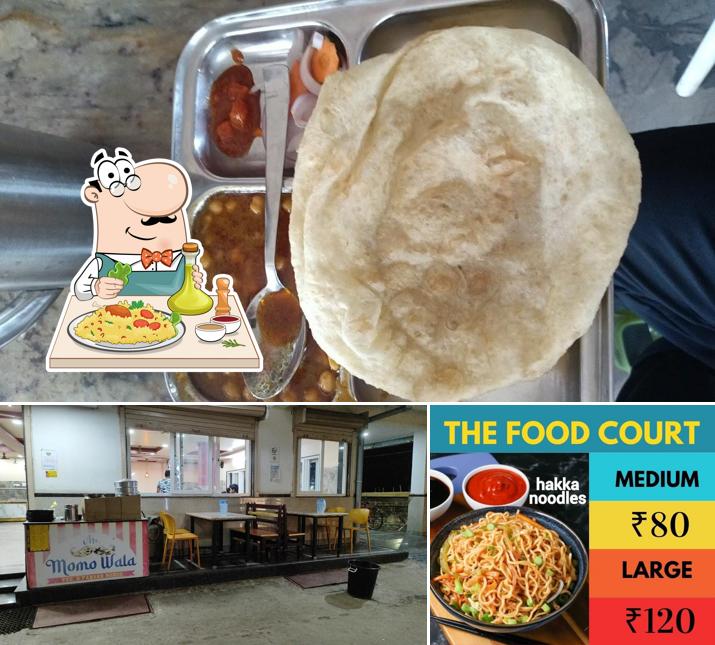 Check out the image displaying food and interior at The Food Court