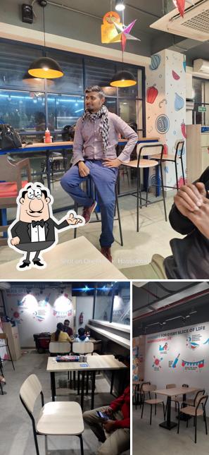 Check out how Domino's Pizza Pradhan Nagar, Siliguri looks inside