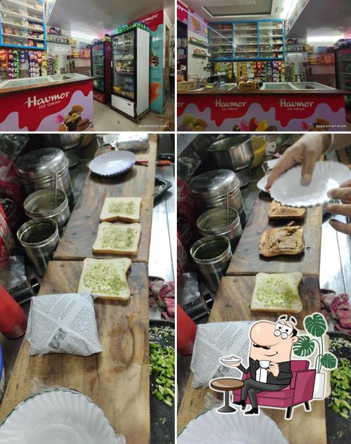 Among different things one can find interior and food at Mahadev Pizza