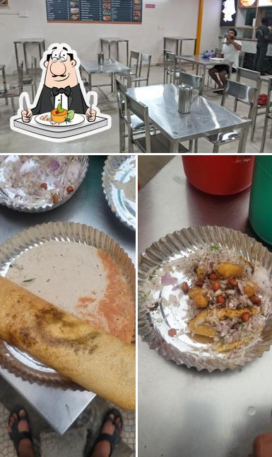 Check out the image displaying food and interior at Amrutha Vilas