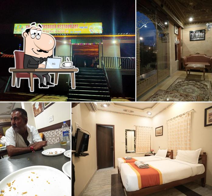 Take a seat at one of the tables at Hotel Yaduraj Heritage