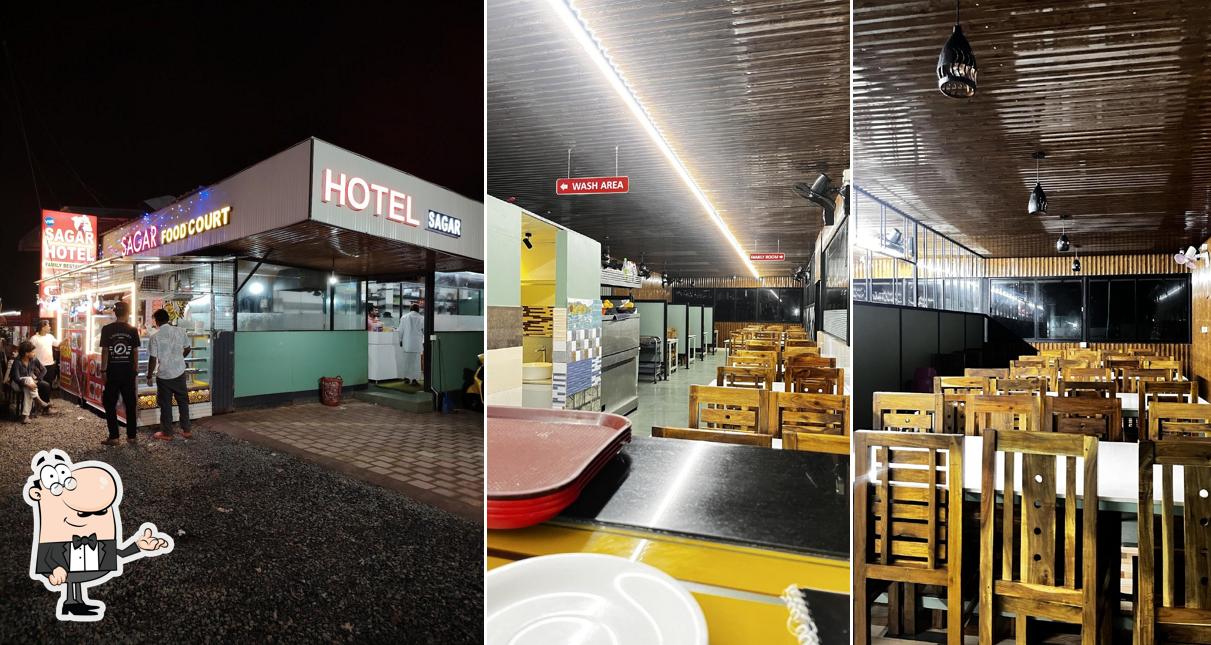 Take a seat at one of the tables at VNB SAGAR HOTEL & RESTAURANT