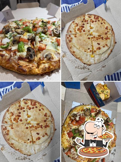 Try out pizza at Domino's Pizza Phullawal chowk