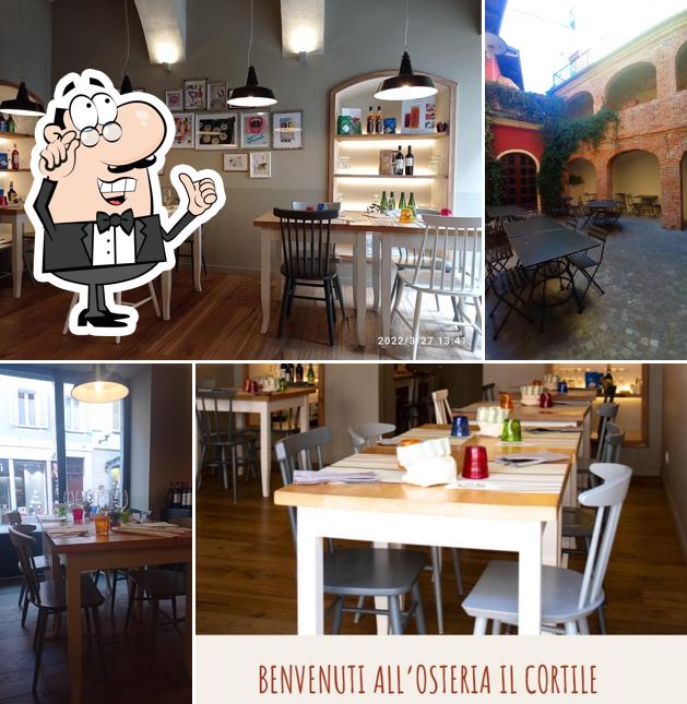 Siediti a un tavolo di Osteria Il Cortile