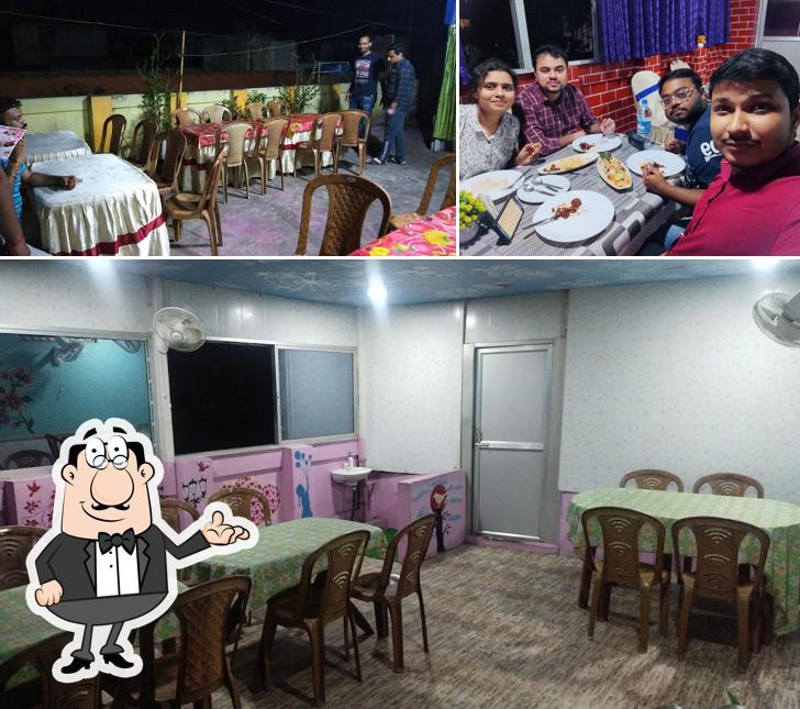 Take a seat at one of the tables at TANDOOR HOUSE – Multi Cuisine Restaurant