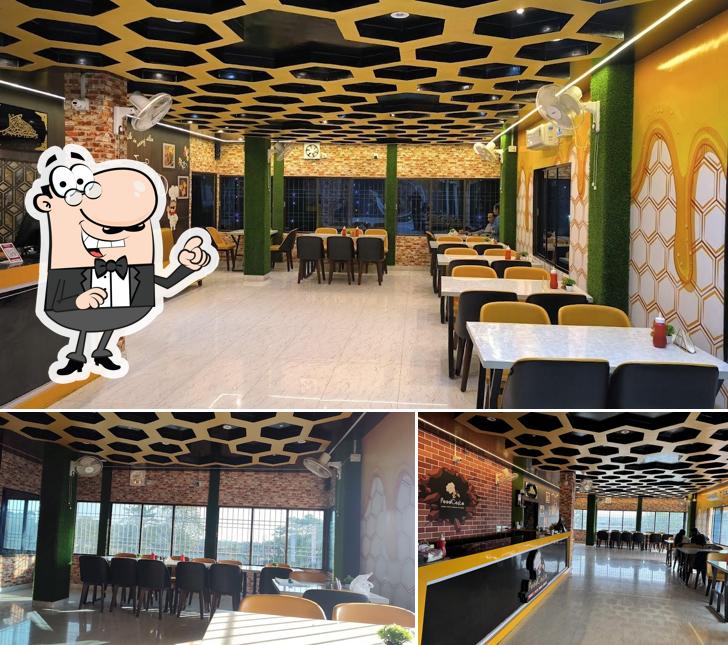 Take a seat at one of the tables at Foodcosta Assam