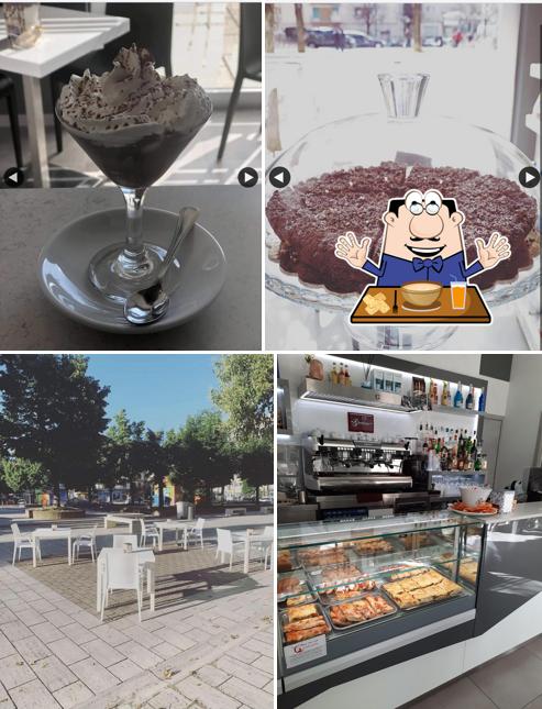 Questa è la immagine che mostra la cibo e interni di White Cafè