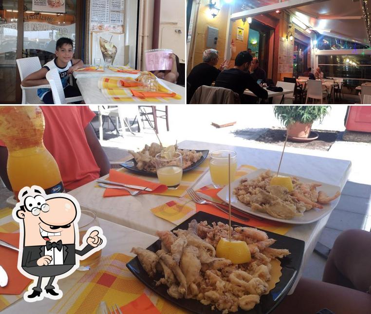 Siediti a un tavolo di Ristorante Un Posto Al Sole Fiumicino