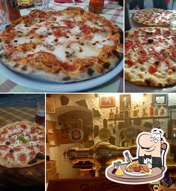 A Pizzeria Abat-Jour, puoi assaggiare una bella pizza