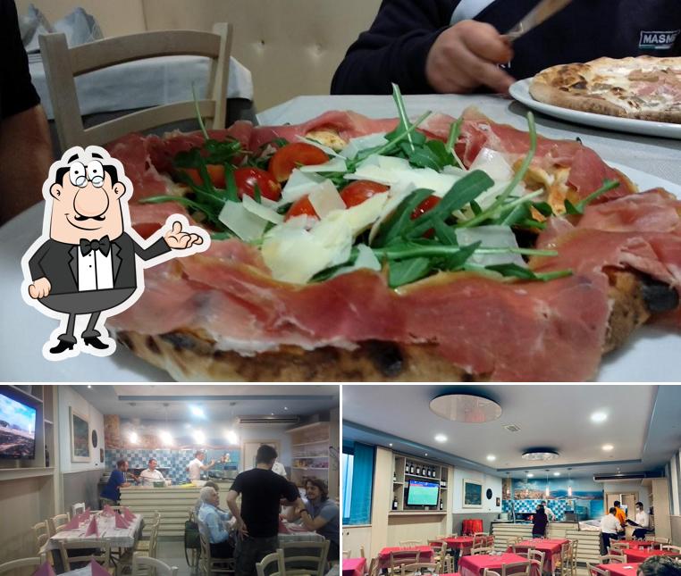 Dai un'occhiata agli interni di Pizzeria Bella Napoli