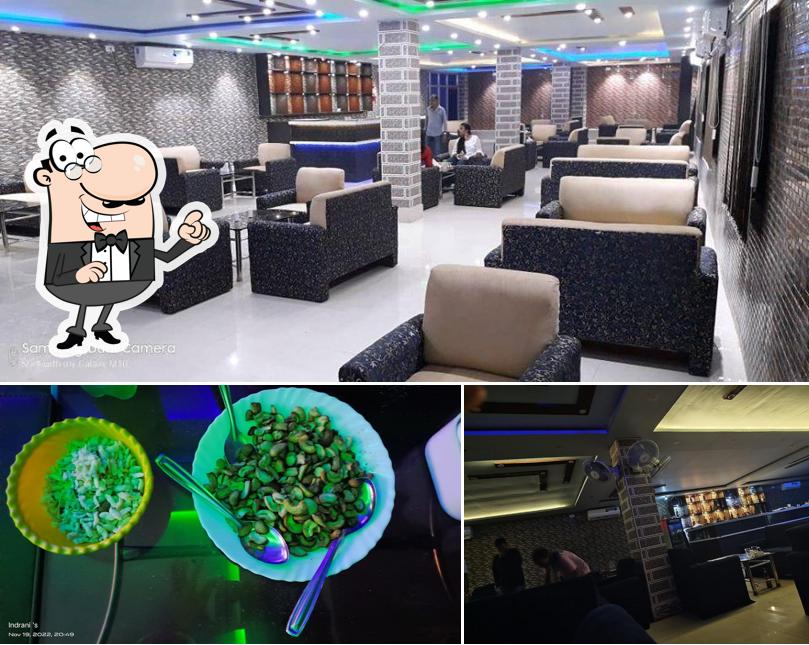 The picture of interior and food at Aabar Restaurant Cum bar