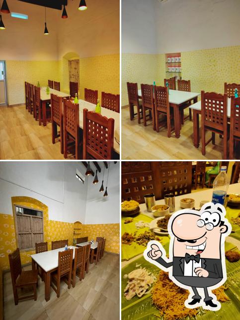 Take a seat at one of the tables at NSK FRIENDS BRIYANI & RESTAURANT