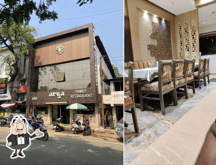 Take a seat at one of the tables at Arya Family Restaurant & Bar