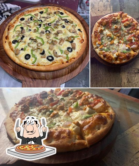 Pick pizza at Foodopia Cafe By Mr. High Foods
