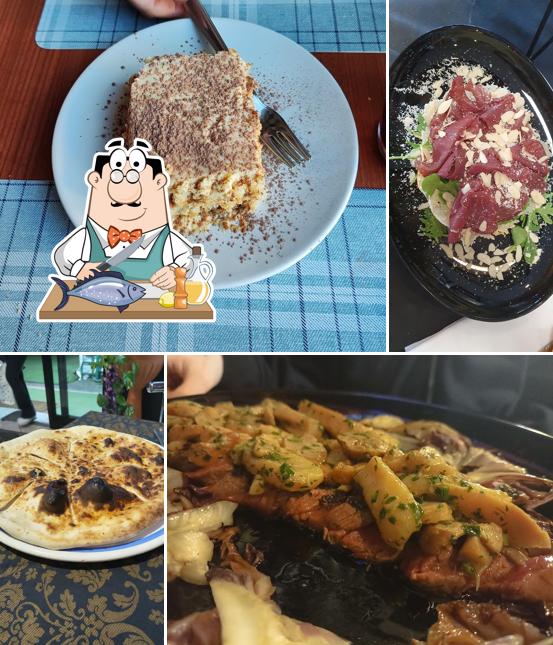 Salmone grigliato al RISTORANTE PIZZERIA MONDOMIO