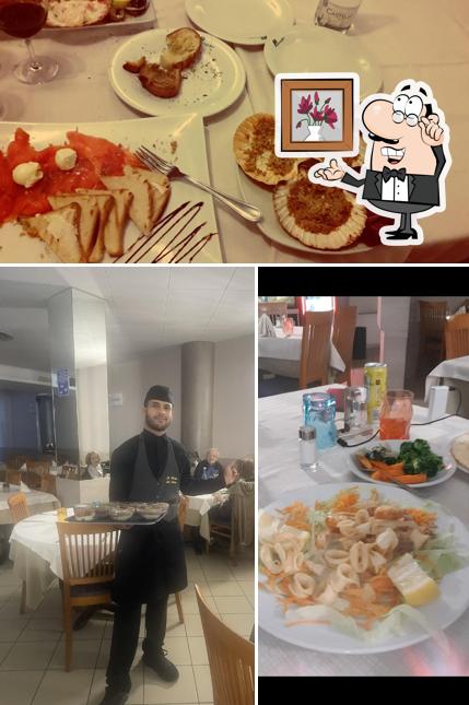 Guarda la foto che mostra la interni e cibo di La Perla Del Mare